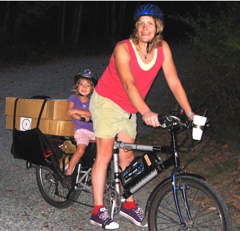 Figure 1: Carrying cargo and passenger on an Xtracycle converted bicycle.